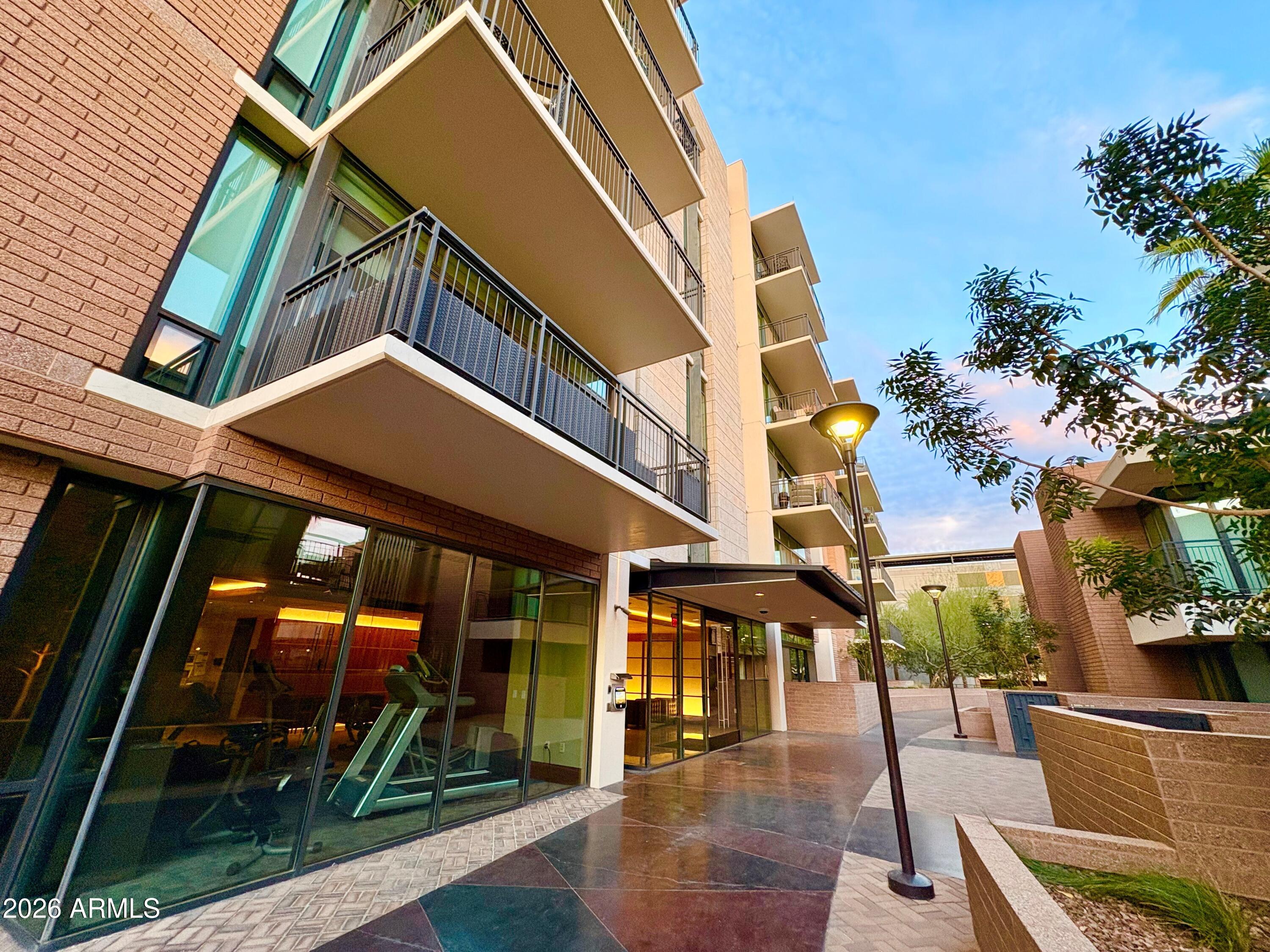 208 West Portland Street, Unit 155 Phoenix, AZ 85003 - Photo 31 of 36 a view of a building with a street
