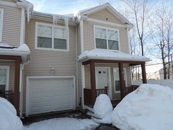32 Junction Street, Unit 5 Needham, MA 02492 - Photo 1 of 4 a front view of a house with a hallway