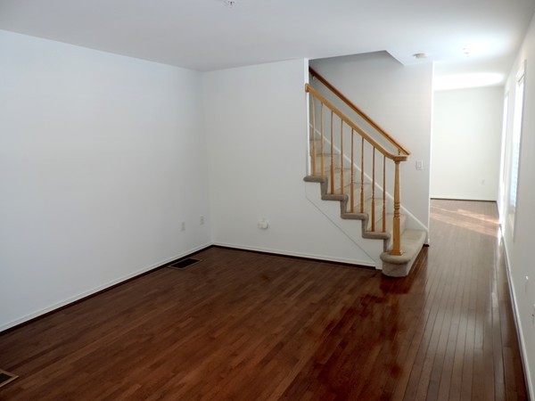 32 Junction Street, Unit 5 Needham, MA 02492 - Photo 4 of 4 a view of entryway with wooden floor