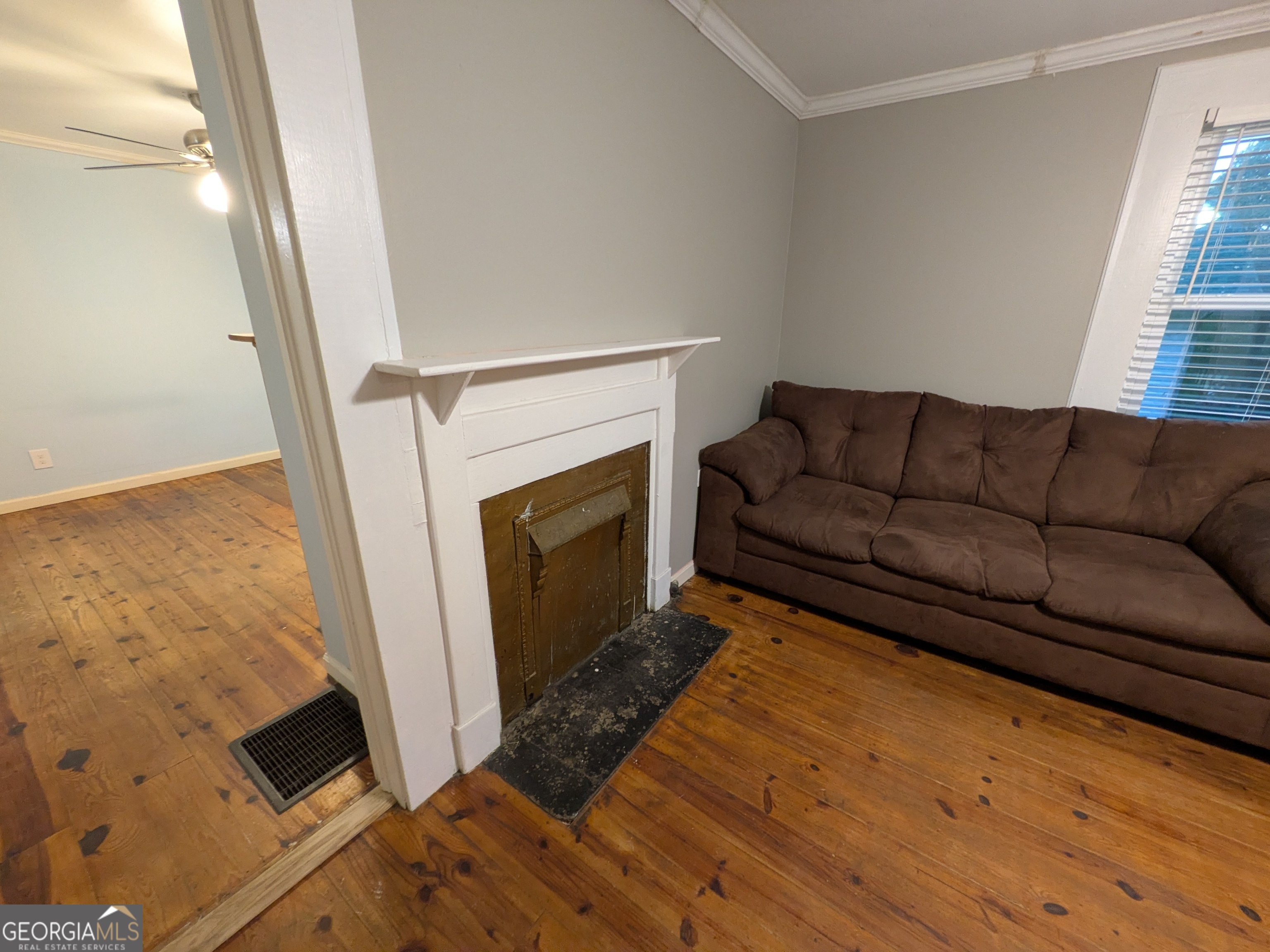 173 Baugh Street Commerce, GA 30529 - Photo 19 of 24 a living room with furniture and a fireplace