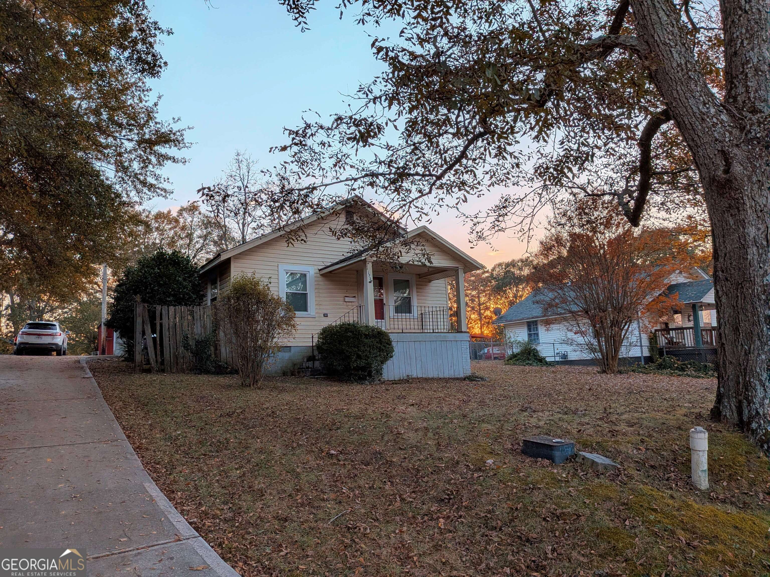 173 Baugh Street Commerce, GA 30529 - Photo 2 of 24 a house view with a outdoor space