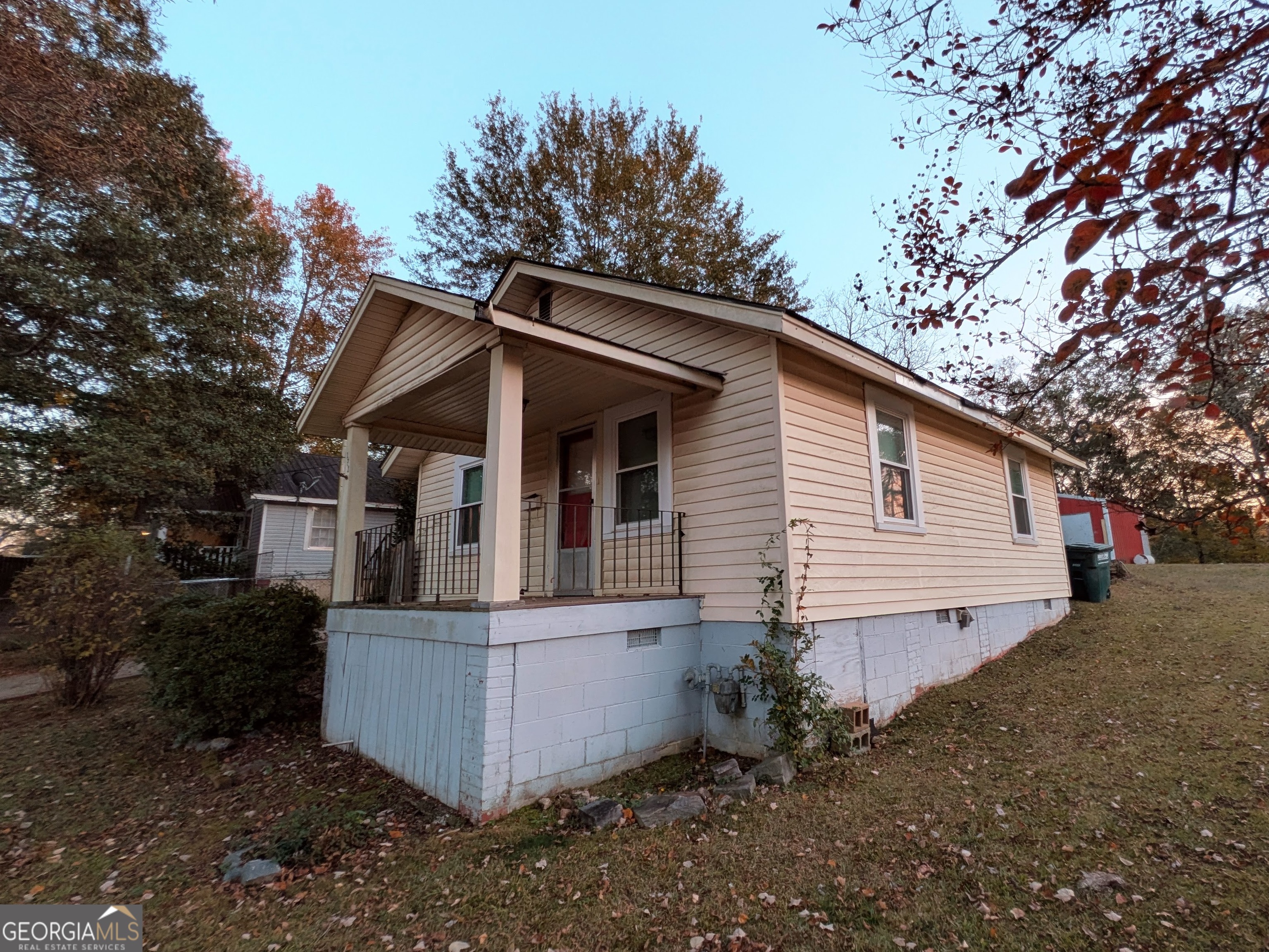 173 Baugh Street Commerce, GA 30529 - Photo 5 of 24 a view of a house with a yard