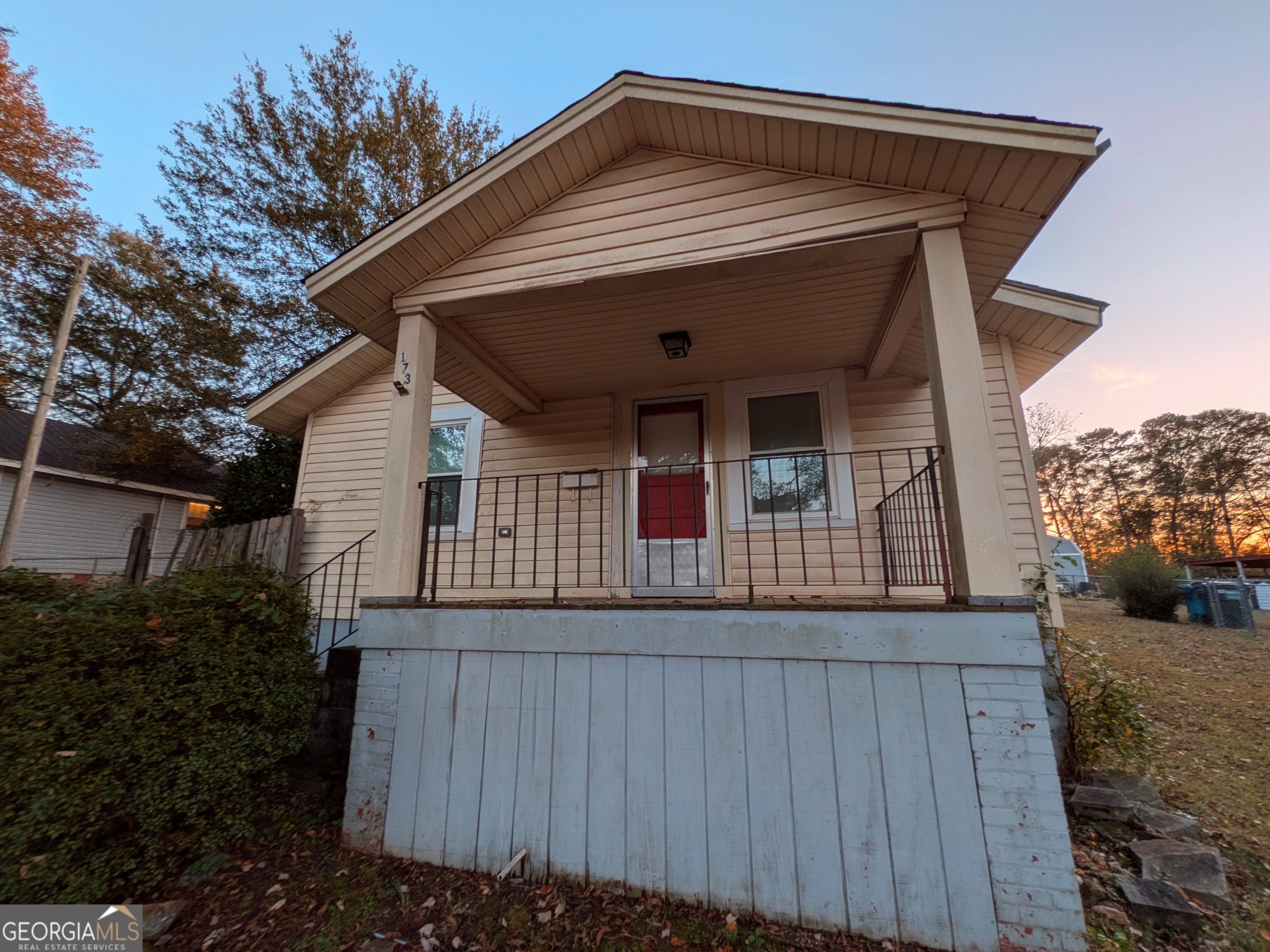 173 Baugh Street Commerce, GA 30529 - Photo 6 of 24 a front view of a house with garage