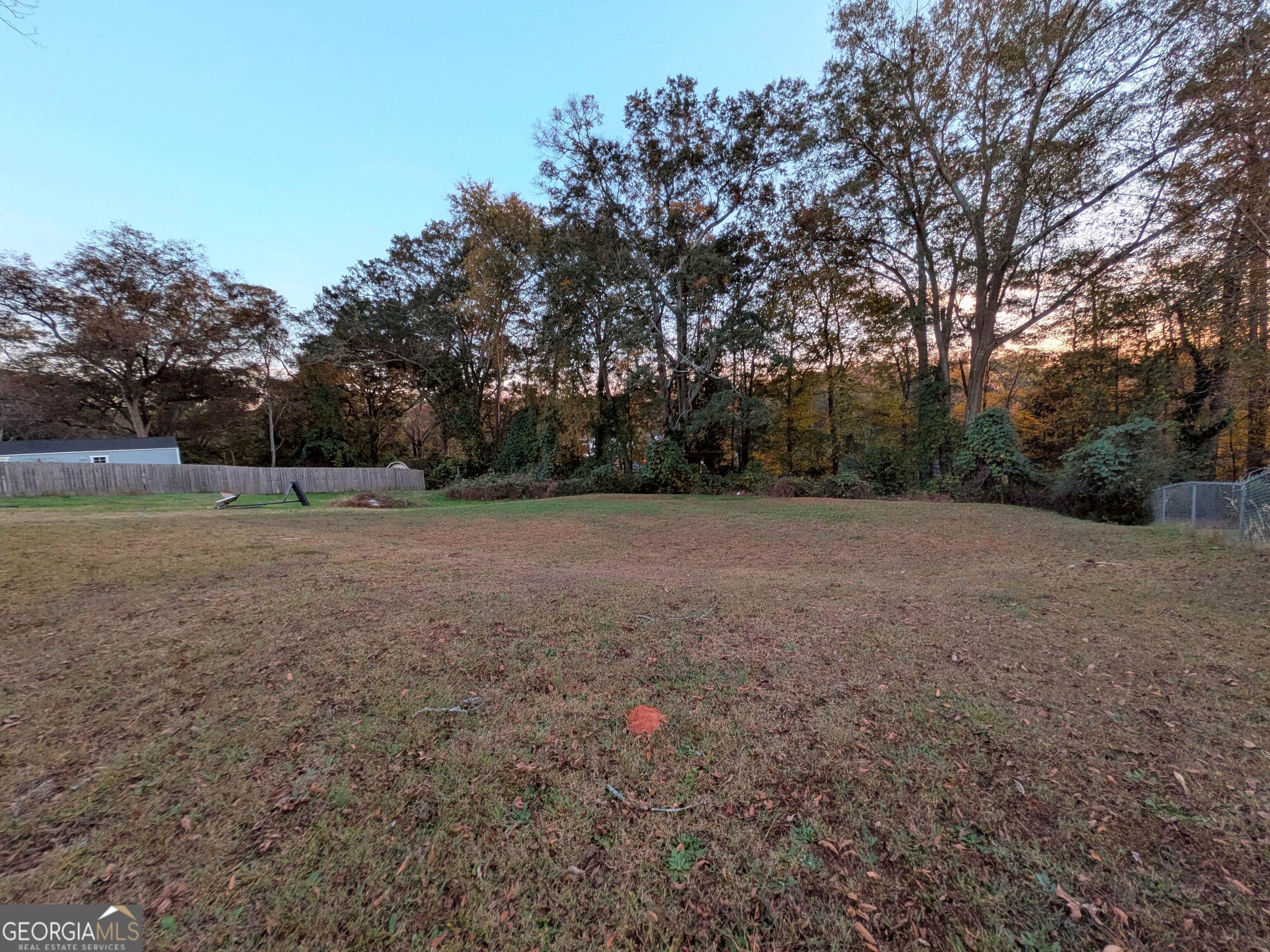 173 Baugh Street Commerce, GA 30529 - Photo 7 of 24 a view of outdoor space with deck and yard