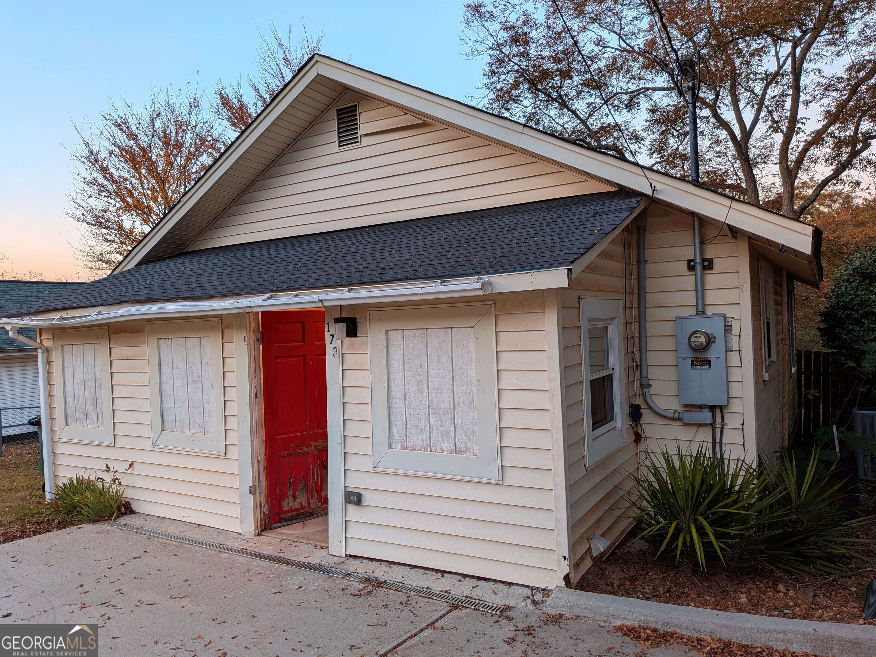 173 Baugh Street Commerce, GA 30529 - Photo 8 of 24 a front view of a house with a yard