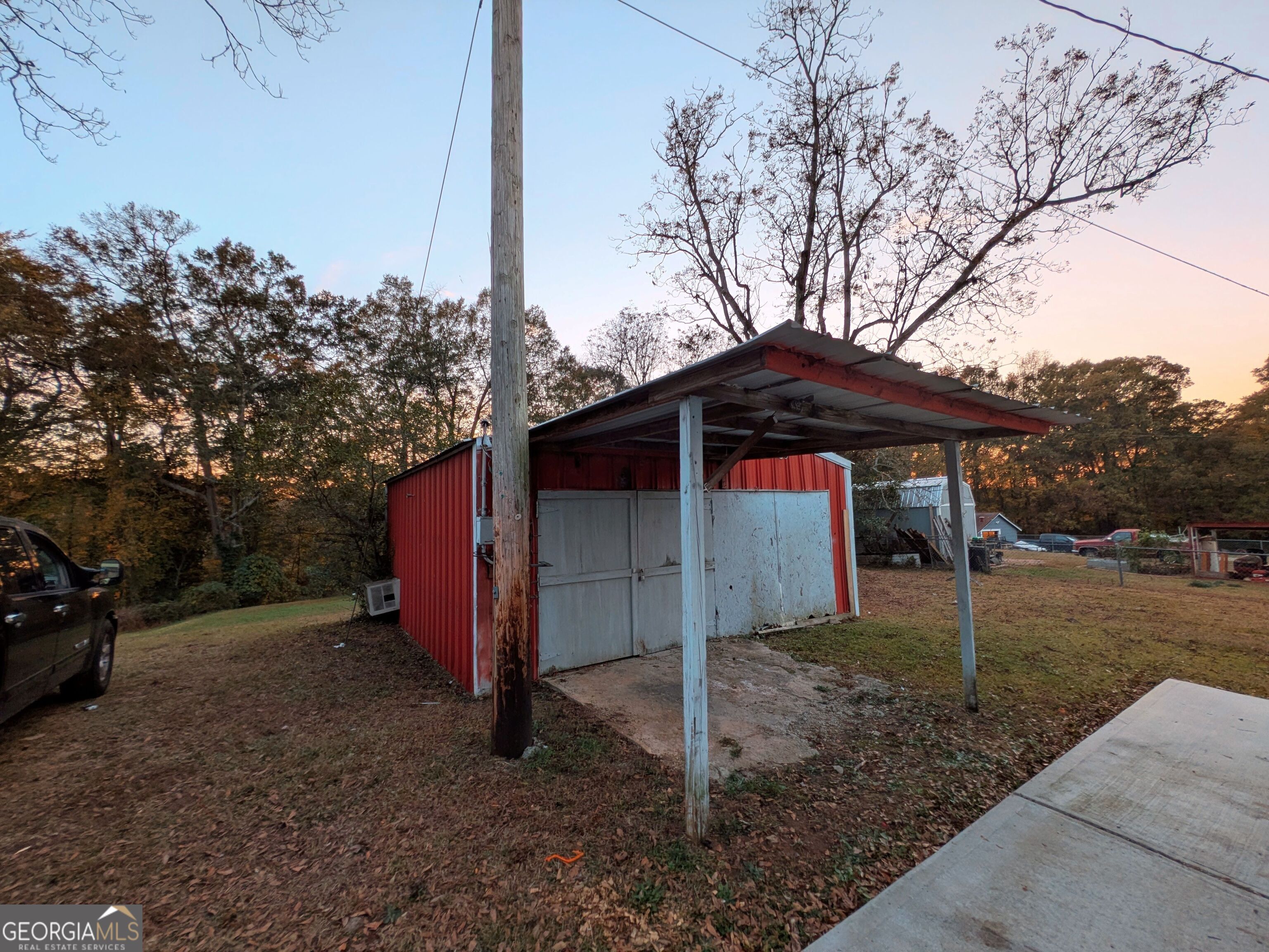 173 Baugh Street Commerce, GA 30529 - Photo 9 of 24 a front view of a house with garden