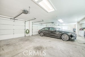 18300 Watts Valley Road Sanger, CA 93657 - Photo 49 of 50 Spacious four-car garage with ample room for vehicles, tools, and storage.
