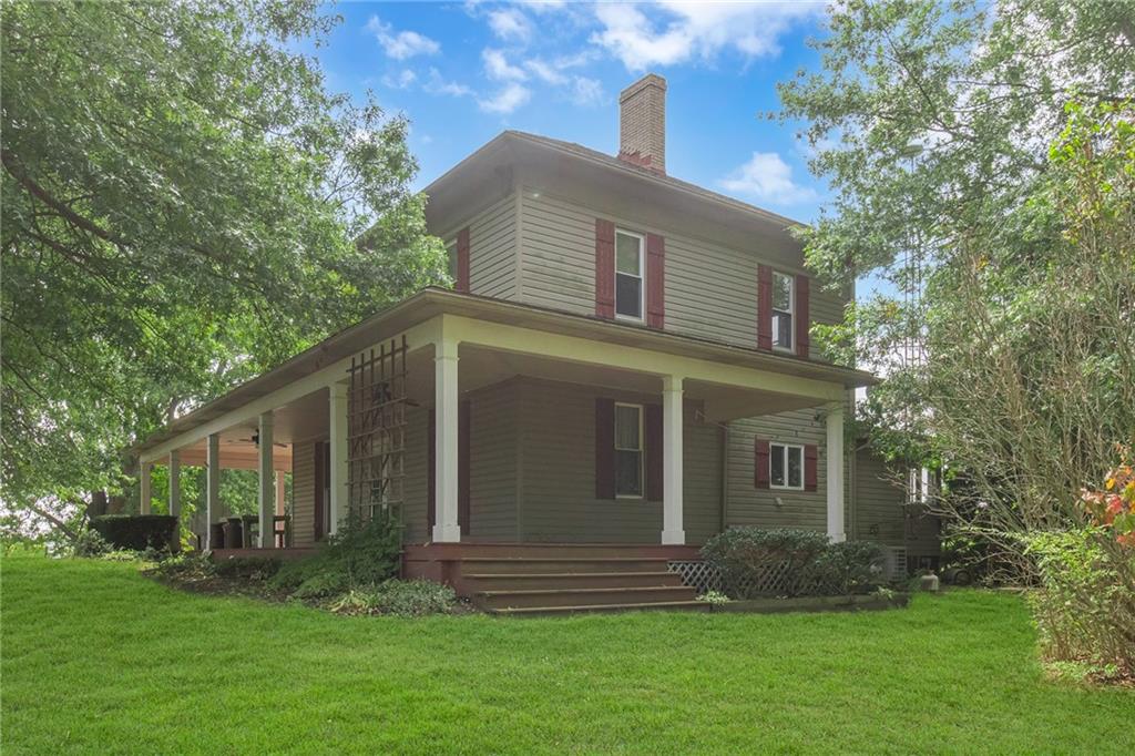 1897 Houston Road Enon Valley, PA 16120 - Photo 2 of 29 Side Porch View with Steps to Yard