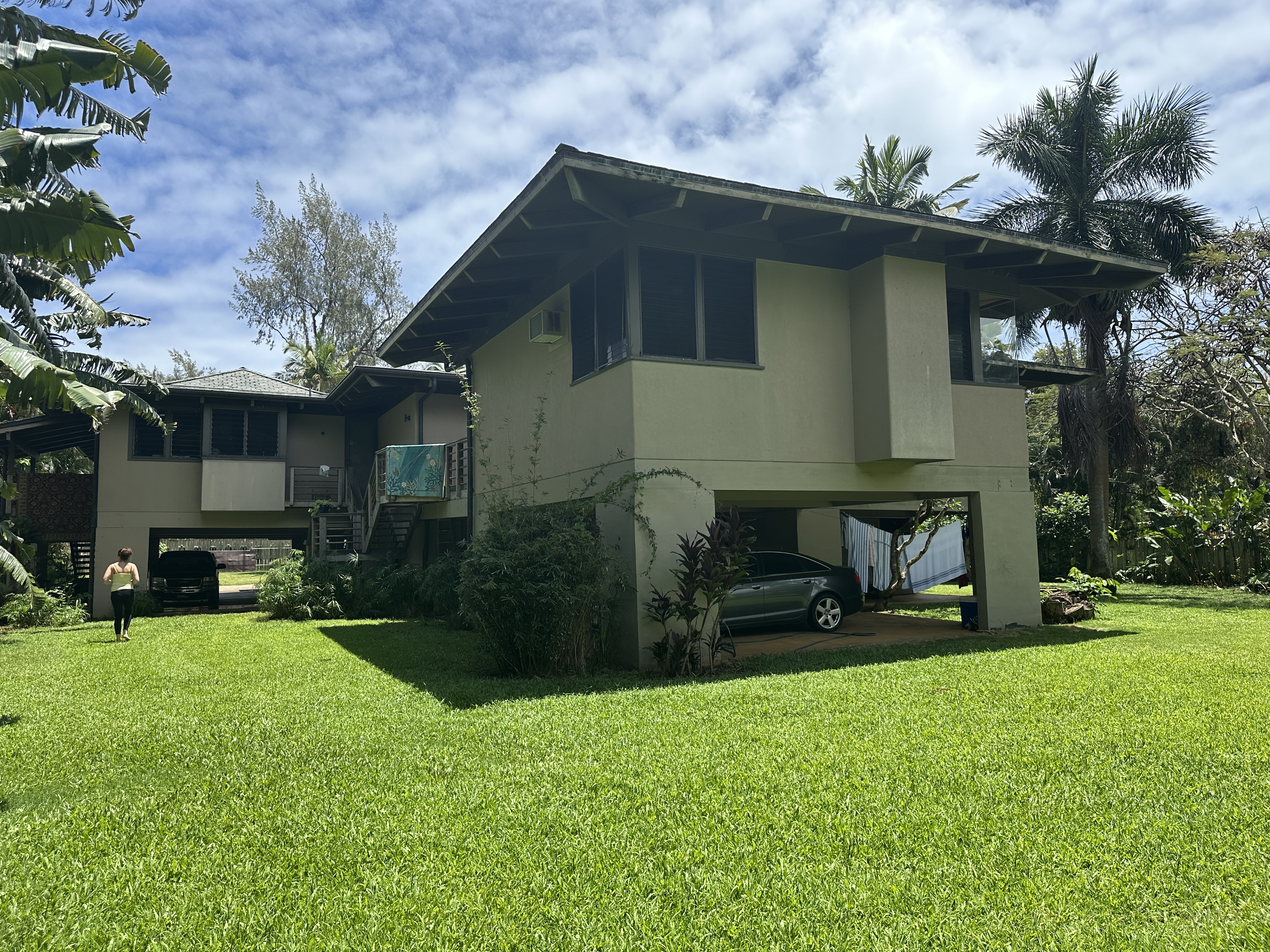 3557 Anini Road Princeville, HI 96722 - Photo 16 of 29 a front view of a house with patio