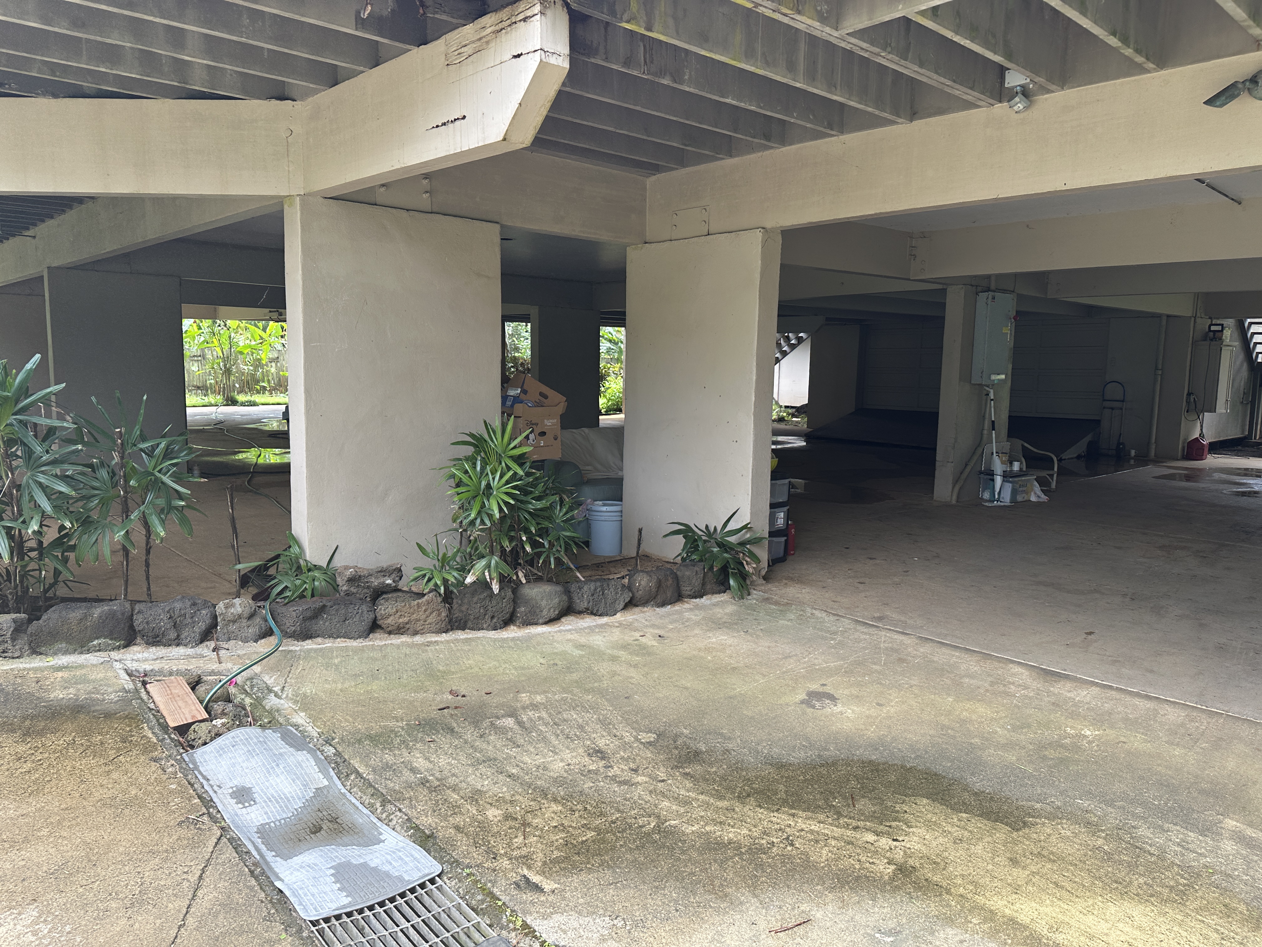 3557 Anini Road Princeville, HI 96722 - Photo 17 of 29 a view of a house with potted plants