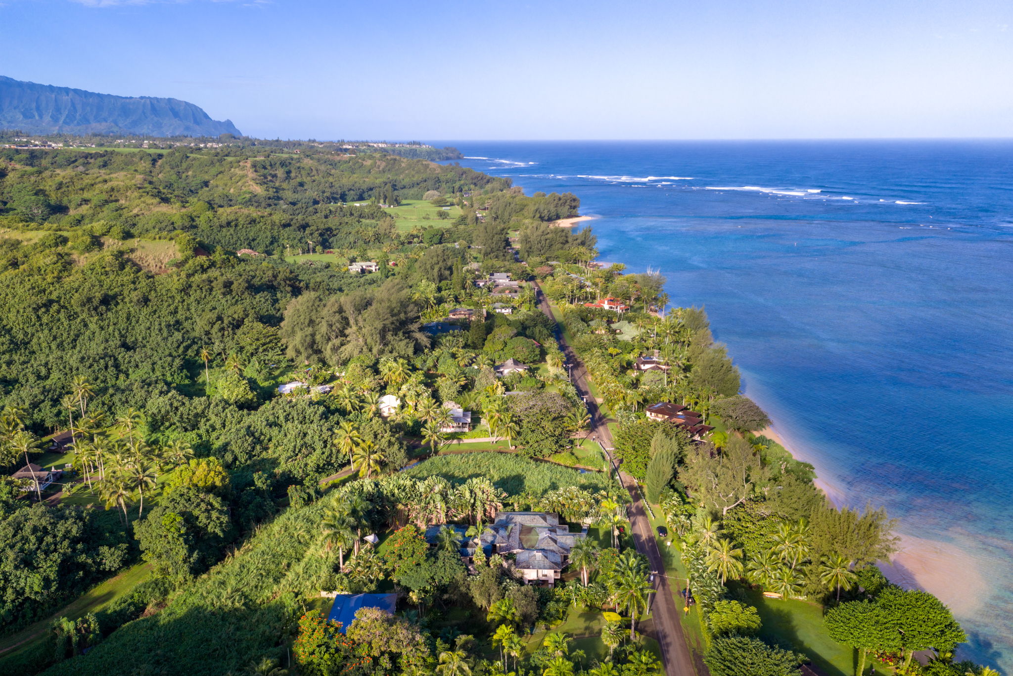 3557 Anini Road Princeville, HI 96722 - Photo 25 of 29 a view of a lake with mountains in the background