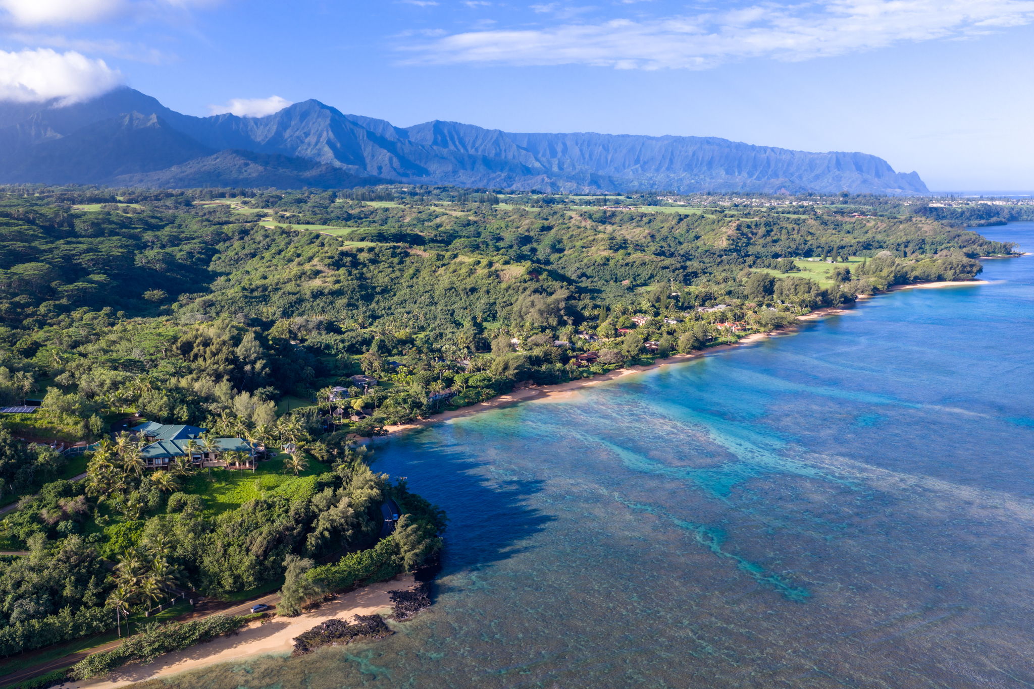 3557 Anini Road Princeville, HI 96722 - Photo 28 of 29 a view of a city with mountains in the background