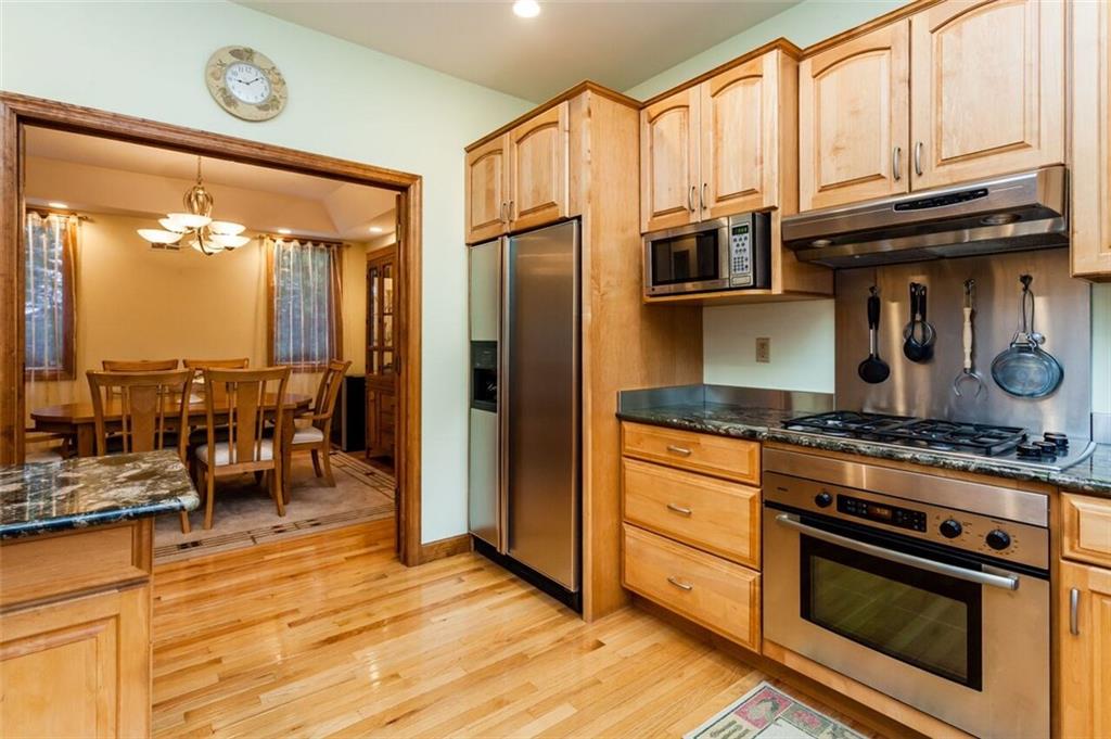 2572 Wexford Run Road Wexford, PA 15090 - Photo 12 of 25 Quality maple cabinets, appliances, and counter tops.