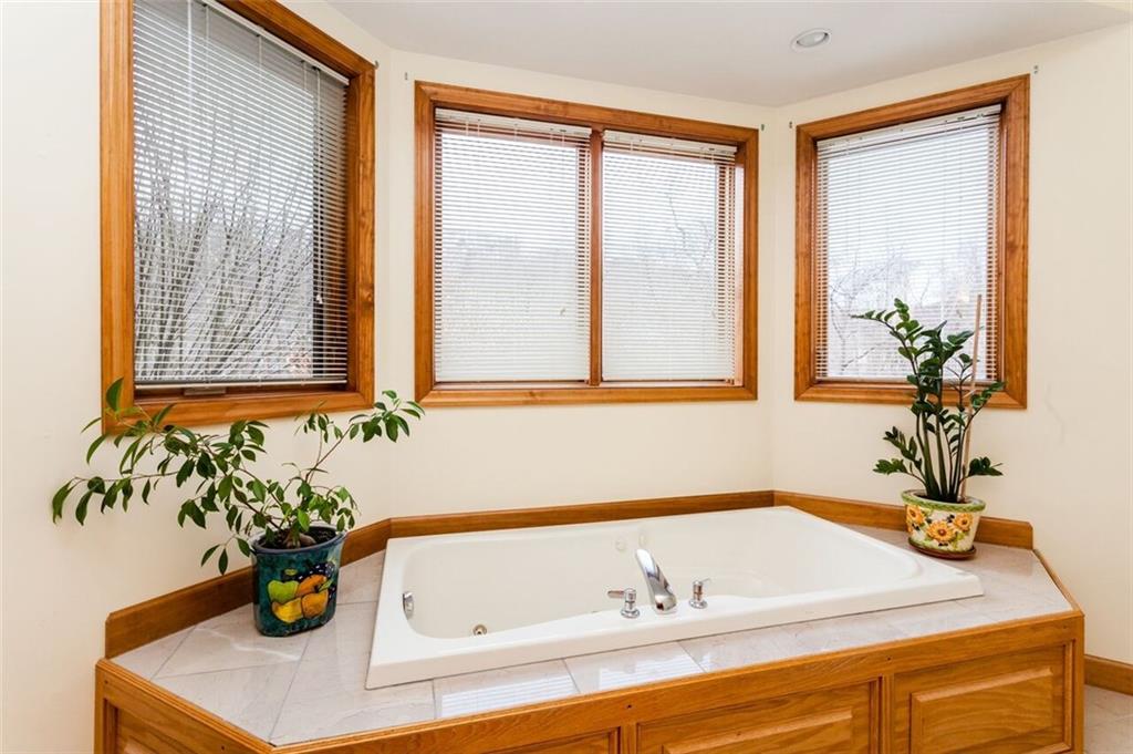 2572 Wexford Run Road Wexford, PA 15090 - Photo 16 of 25 The whirlpool tub in the master bath is tucked into the bay window.