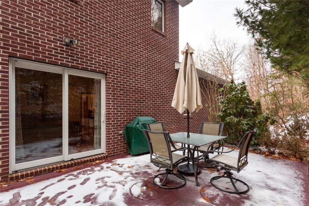 2572 Wexford Run Road Wexford, PA 15090 - Photo 23 of 25 The sliding door in the living room leads to a private patio.