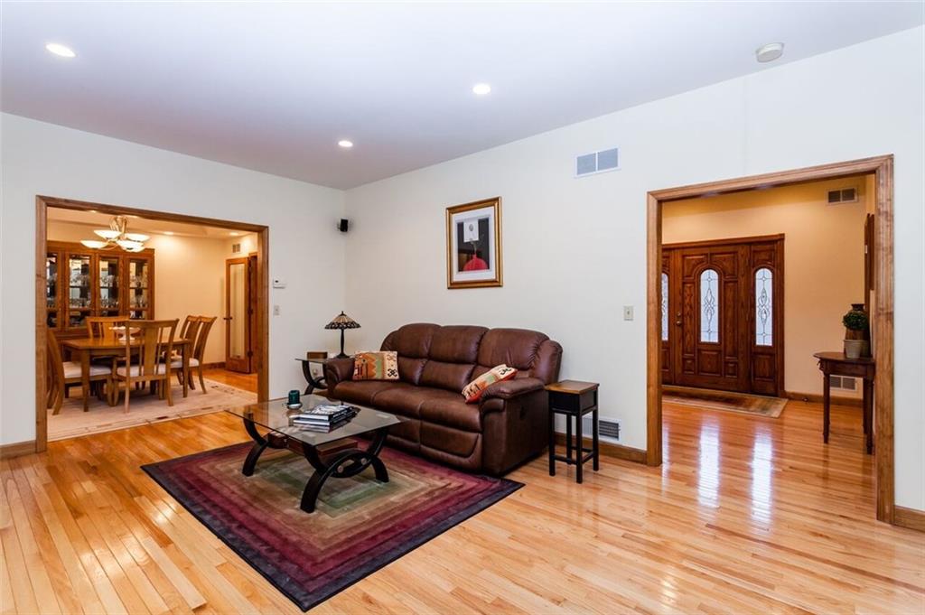 2572 Wexford Run Road Wexford, PA 15090 - Photo 5 of 25 The living room adjoins the dining room for easy entertaining.