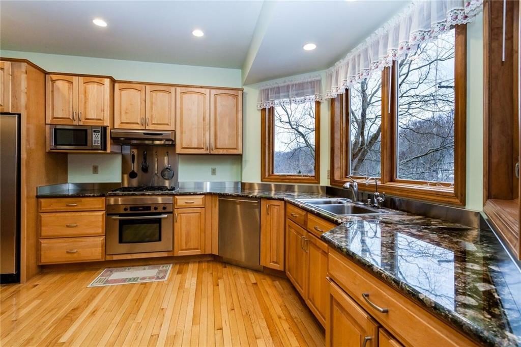 2572 Wexford Run Road Wexford, PA 15090 - Photo 9 of 25 The huge bay window floods the kitchen with plenty of natural light!