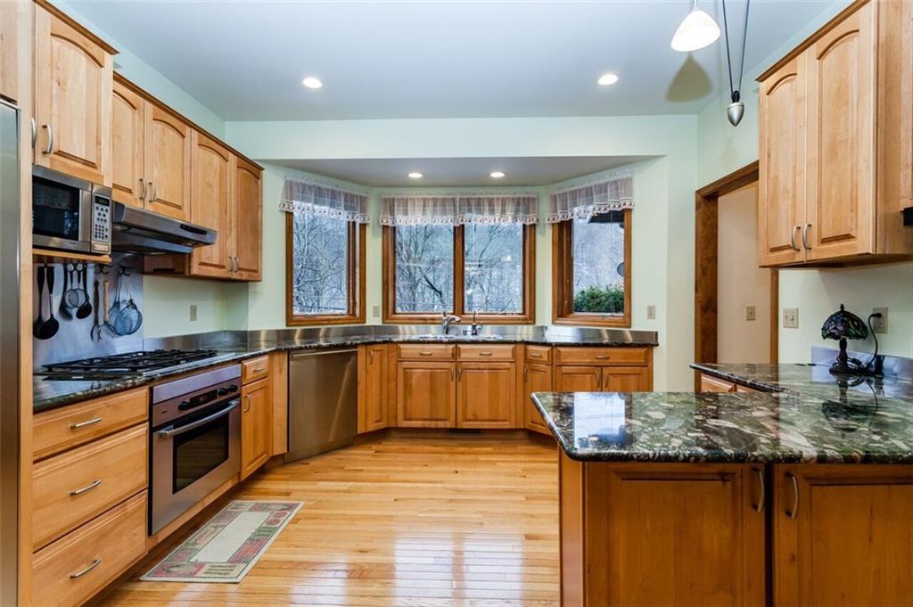 2572 Wexford Run Road Wexford, PA 15090 - Photo 10 of 25 The kitchen features a mini hot water heater under the kitchen sink for instant hot water and an under sink reverse osmosis water purification system for cleaner drinking and cooking water!