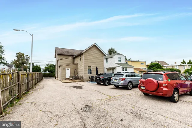a cars parked in front of a house