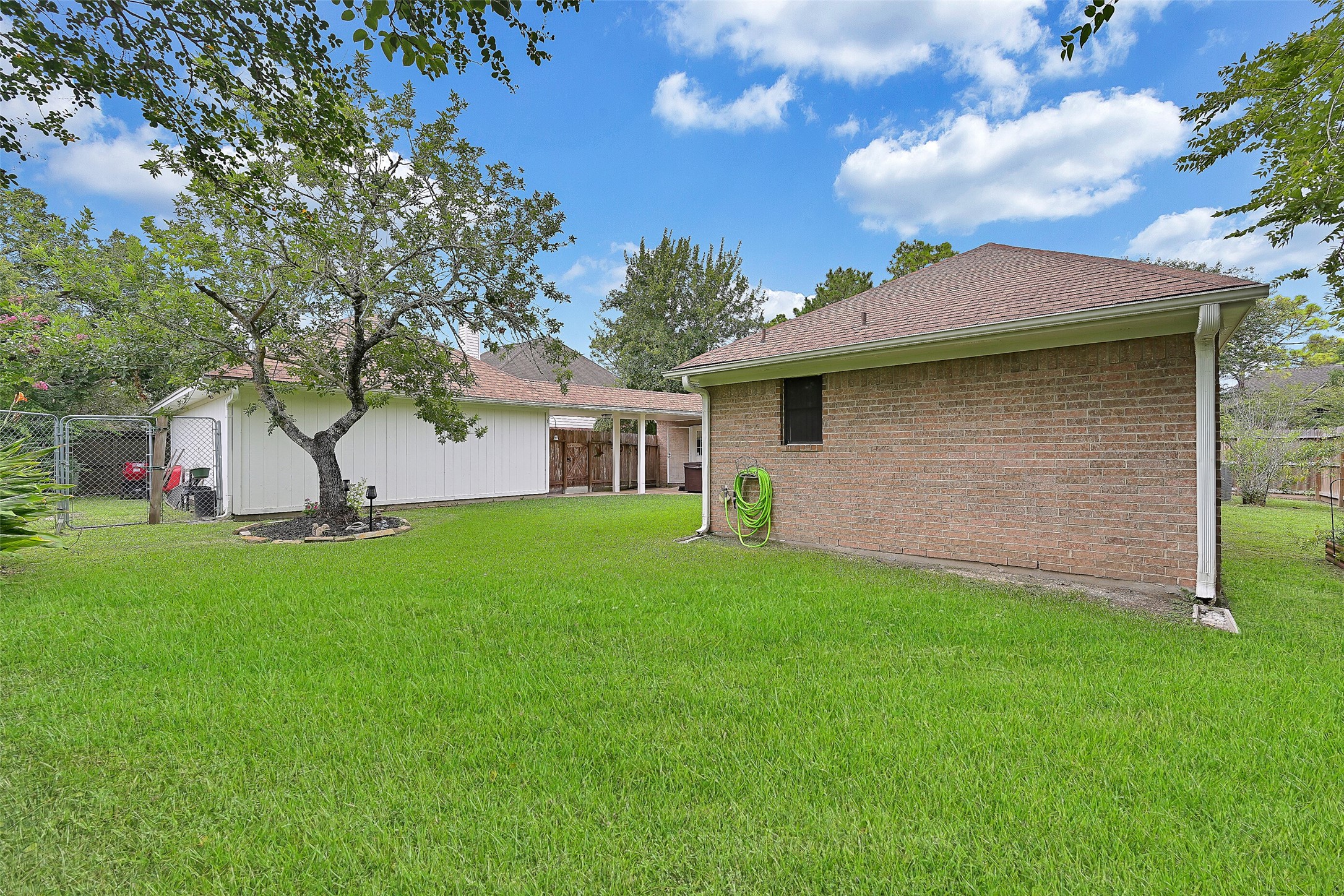 1606 Falcon Ridge Boulevard Friendswood, TX 77546 - Photo 24 of 24 a front view of house with yard and green space