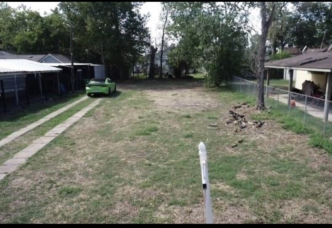 4013 Hain Street Houston, TX 77009 - Photo 4 of 5 a backyard of a house with table and chairs