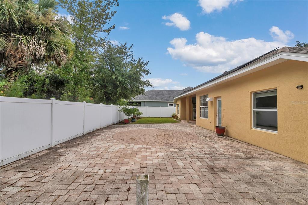 57 Chrysanthemum Drive Ormond Beach, FL 32174 - Photo 35 of 35 a view of a backyard of the house