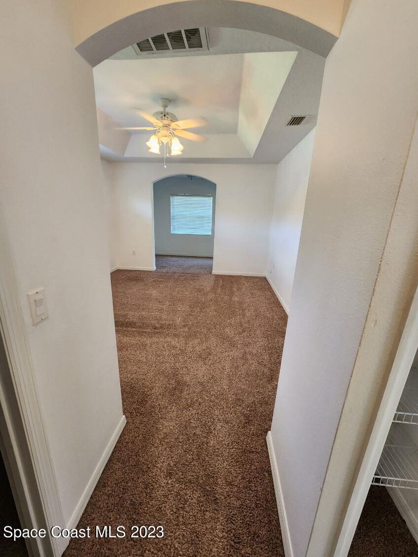 2004 Gloria Circle Palm Bay, FL 32905 - Photo 13 of 54 a view of a hallway to a room