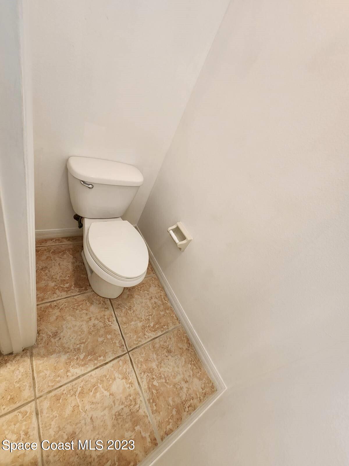 2004 Gloria Circle Palm Bay, FL 32905 - Photo 15 of 54 a bathroom with a toilet