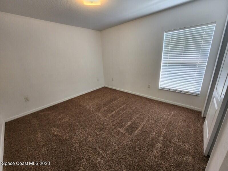 2004 Gloria Circle Palm Bay, FL 32905 - Photo 25 of 54 an empty room with a window