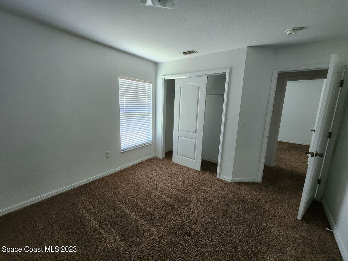 2004 Gloria Circle Palm Bay, FL 32905 - Photo 36 of 54 an empty room with closet