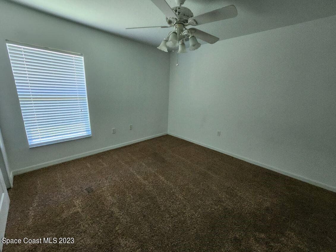 2004 Gloria Circle Palm Bay, FL 32905 - Photo 38 of 54 an empty room with a window