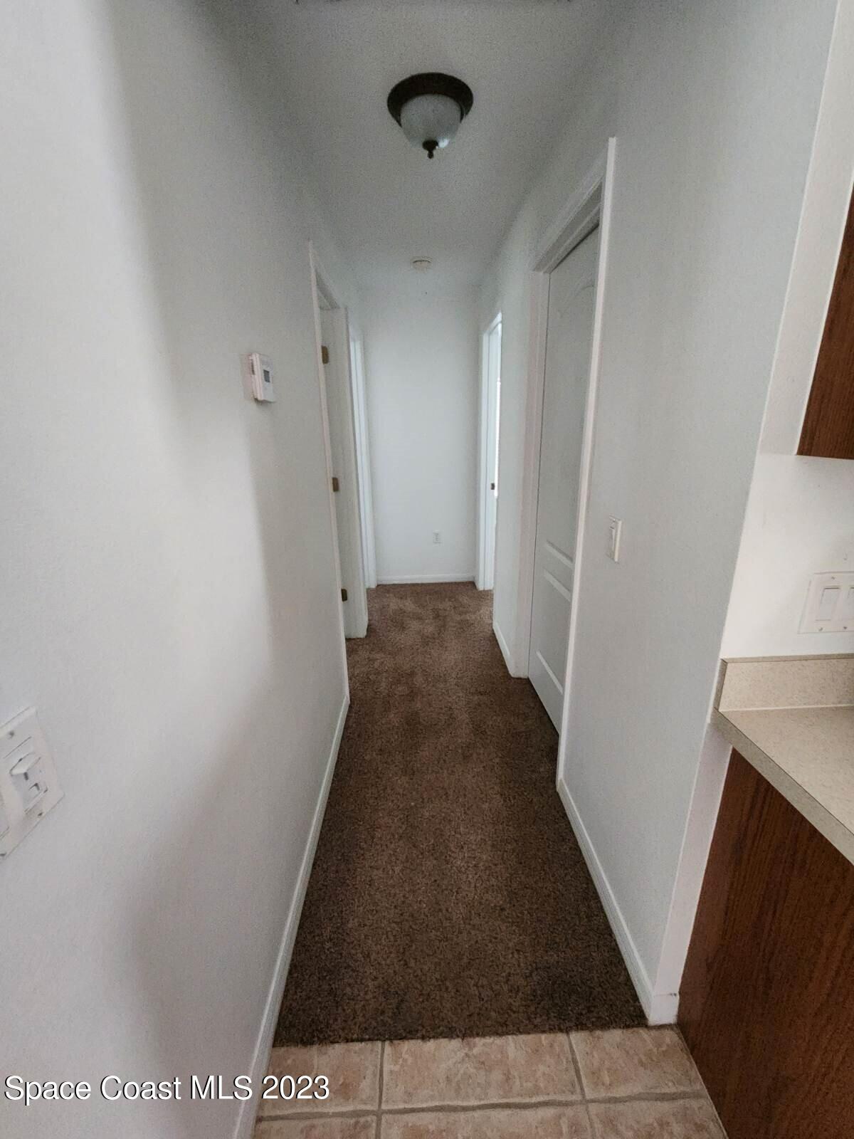 2004 Gloria Circle Palm Bay, FL 32905 - Photo 40 of 54 a view of a hallway