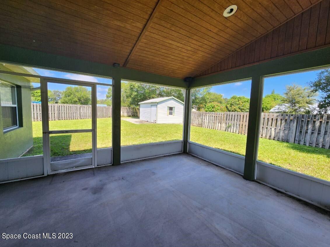 2004 Gloria Circle Palm Bay, FL 32905 - Photo 50 of 54 a view of an empty room with a large window