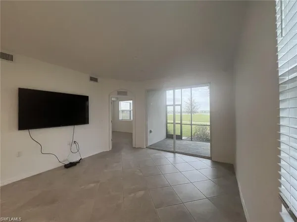 an empty room with windows