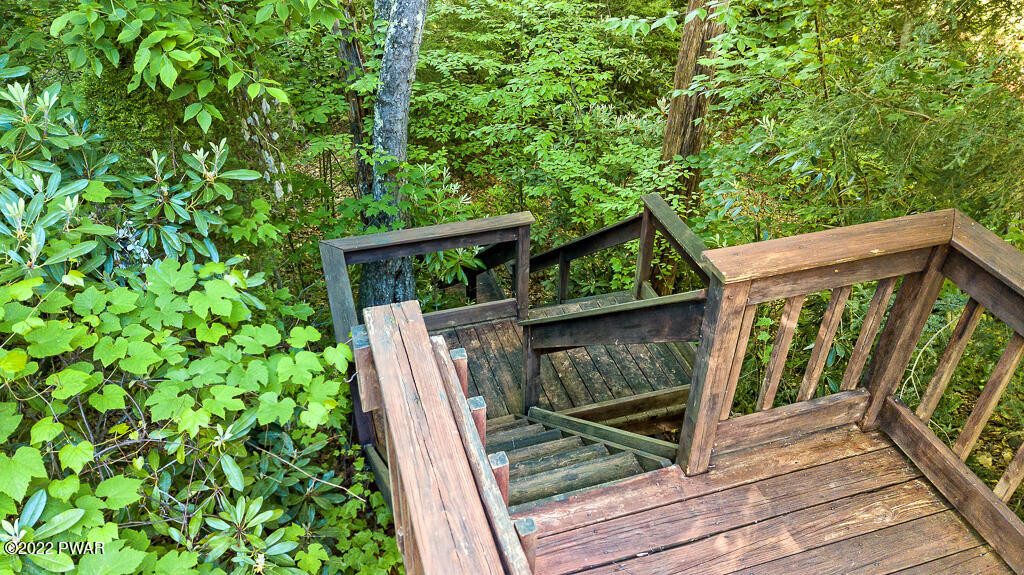 166 Devils Hole Road Cresco, PA 18326 - Photo 41 of 46 a view of balcony with wooden floor and fence
