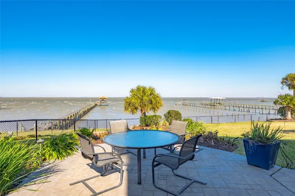 a view of a chairs and table on the terrace