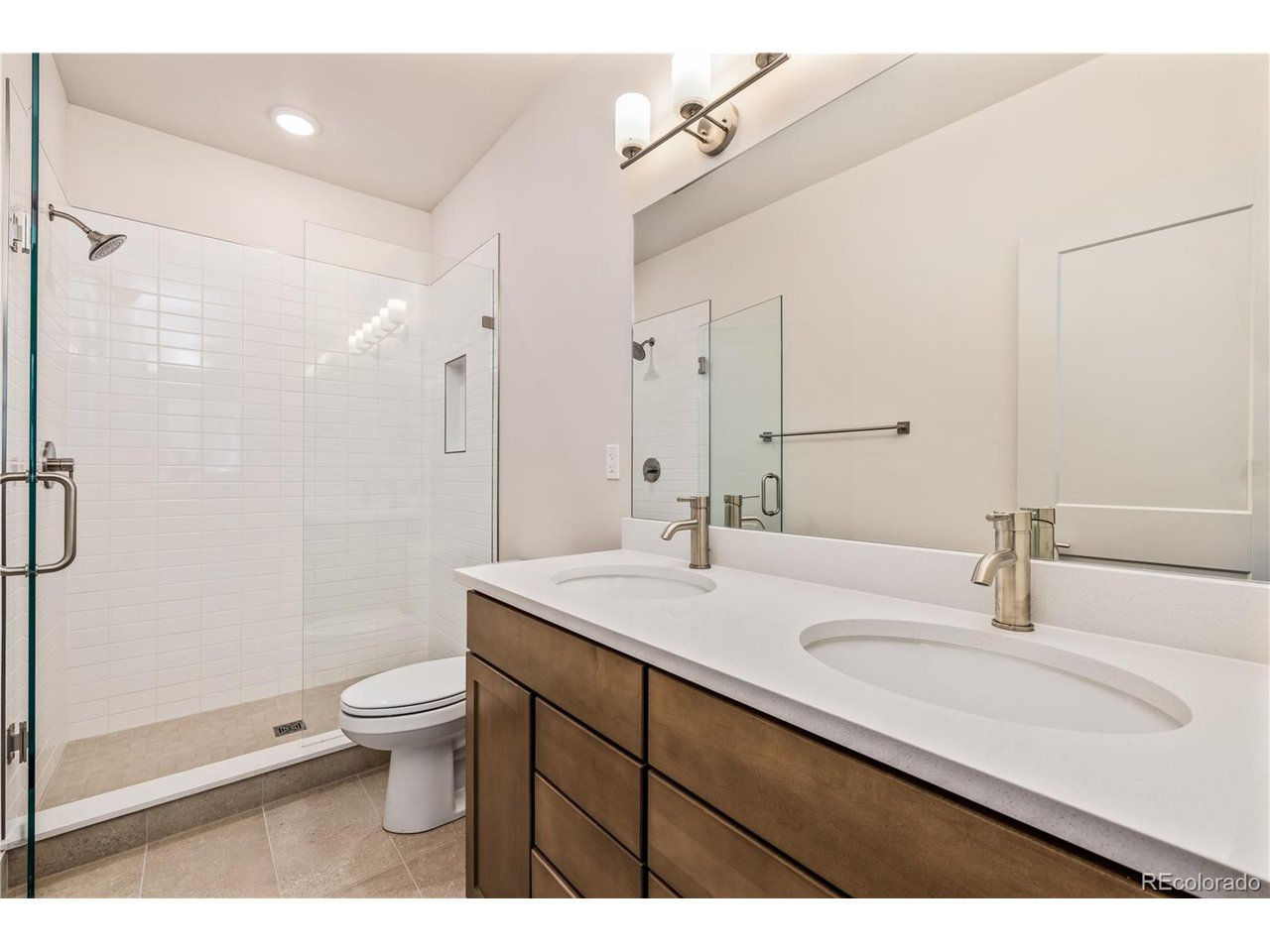 624 Montezuma Road, Unit D Keystone, CO 80435 - Photo 18 of 31 a bathroom with a sink a toilet and shower