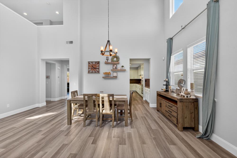 1820 Donner Road West Sacramento, CA 95691 - Photo 12 of 44 a view of a dining room with furniture and wooden floor