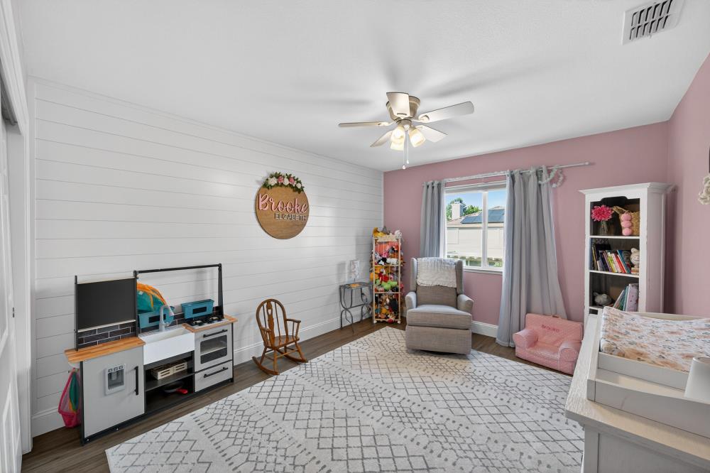 1820 Donner Road West Sacramento, CA 95691 - Photo 20 of 44 a living room with furniture and a flat screen tv