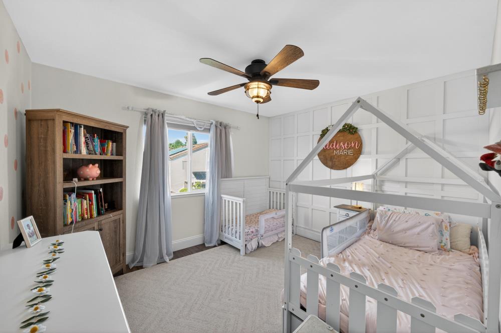1820 Donner Road West Sacramento, CA 95691 - Photo 22 of 44 a living room with furniture and a book shelf