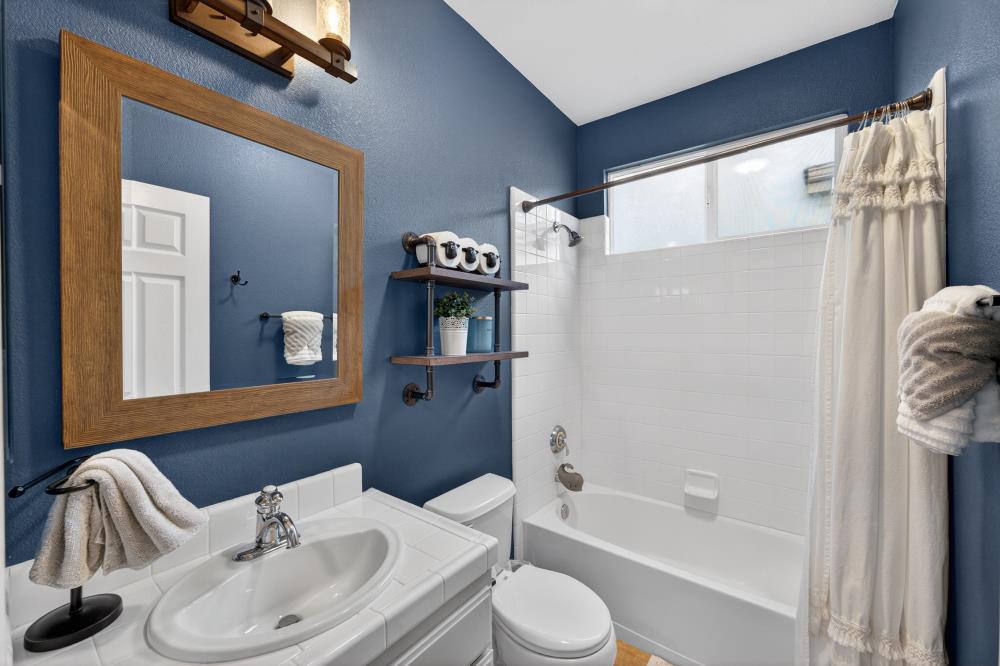 1820 Donner Road West Sacramento, CA 95691 - Photo 26 of 44 a bathroom with a sink toilet and shower