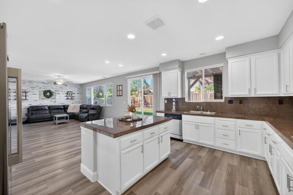 1820 Donner Road West Sacramento, CA 95691 - Photo 3 of 44 a kitchen with sink stove and cabinets