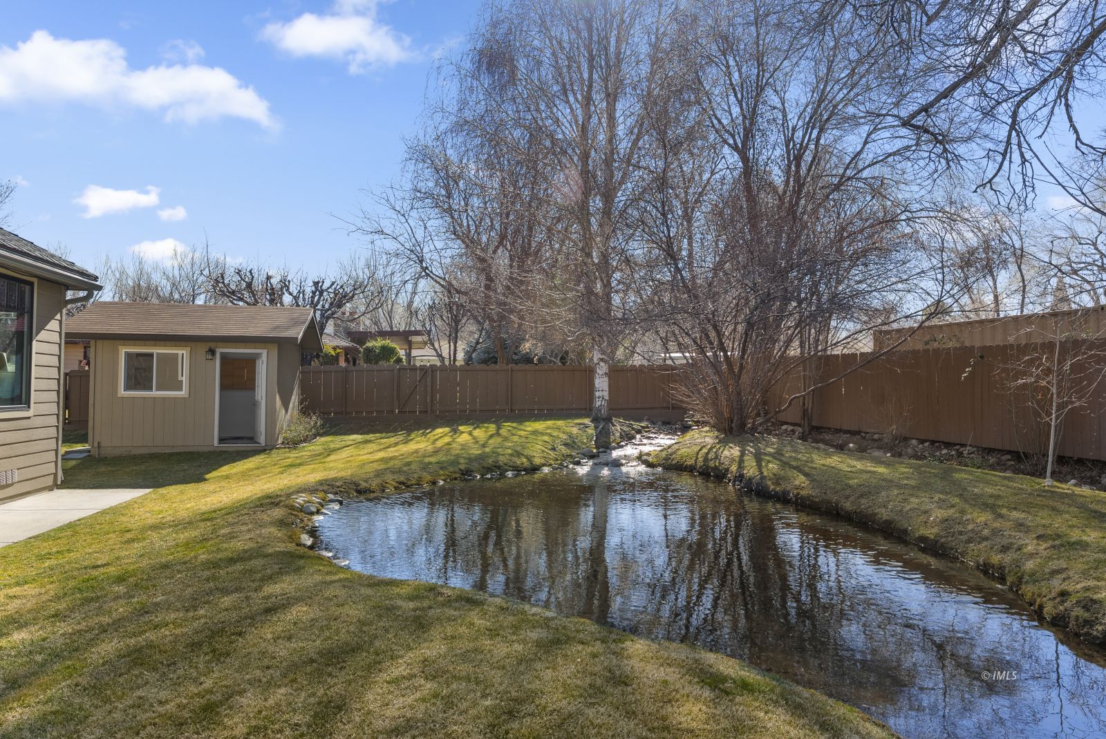 233 Mt Tom Road Bishop, CA 93514 - Photo 31 of 35 Backyard with Creek/Pond