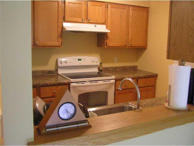 210 Great Harbor Condominium Road, Unit 210 Southwest Harbor, ME 04679 - Photo 5 of 12 Kitchen. Pass through from living...