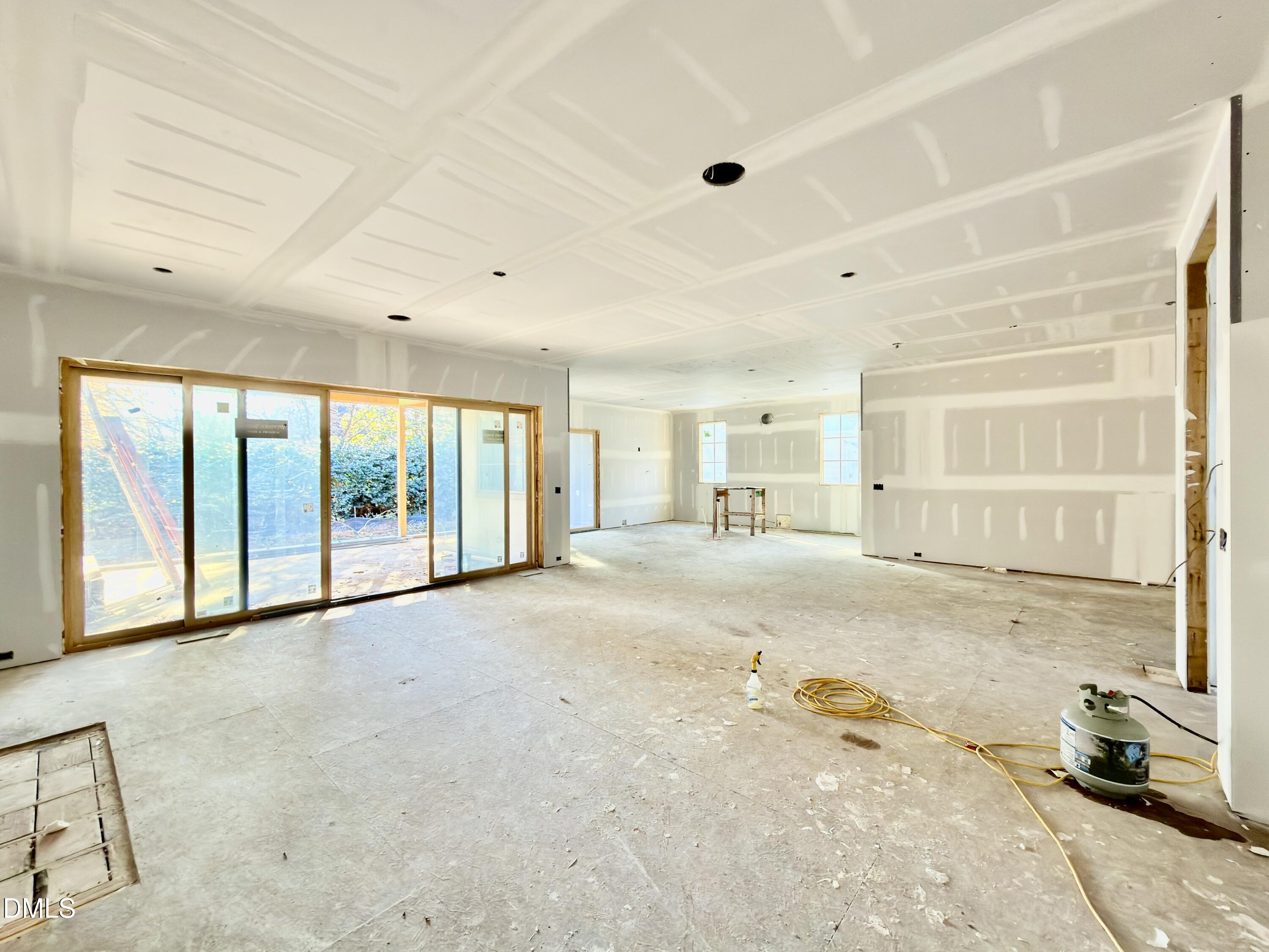 6832 Greystone Drive Raleigh, NC 27615 - Photo 17 of 51 a view of an empty room with a window
