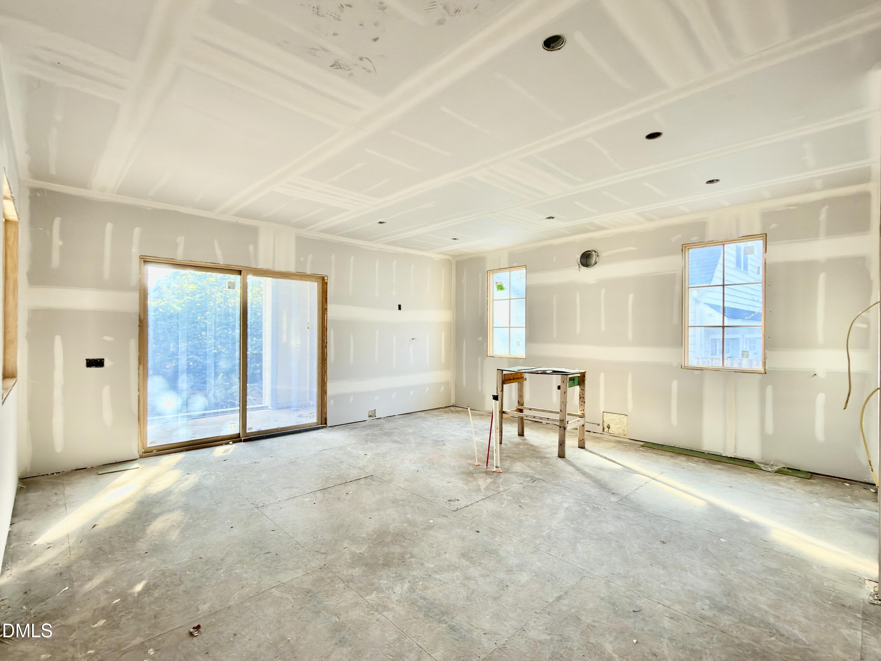 6832 Greystone Drive Raleigh, NC 27615 - Photo 18 of 51 a view of an empty room with a window