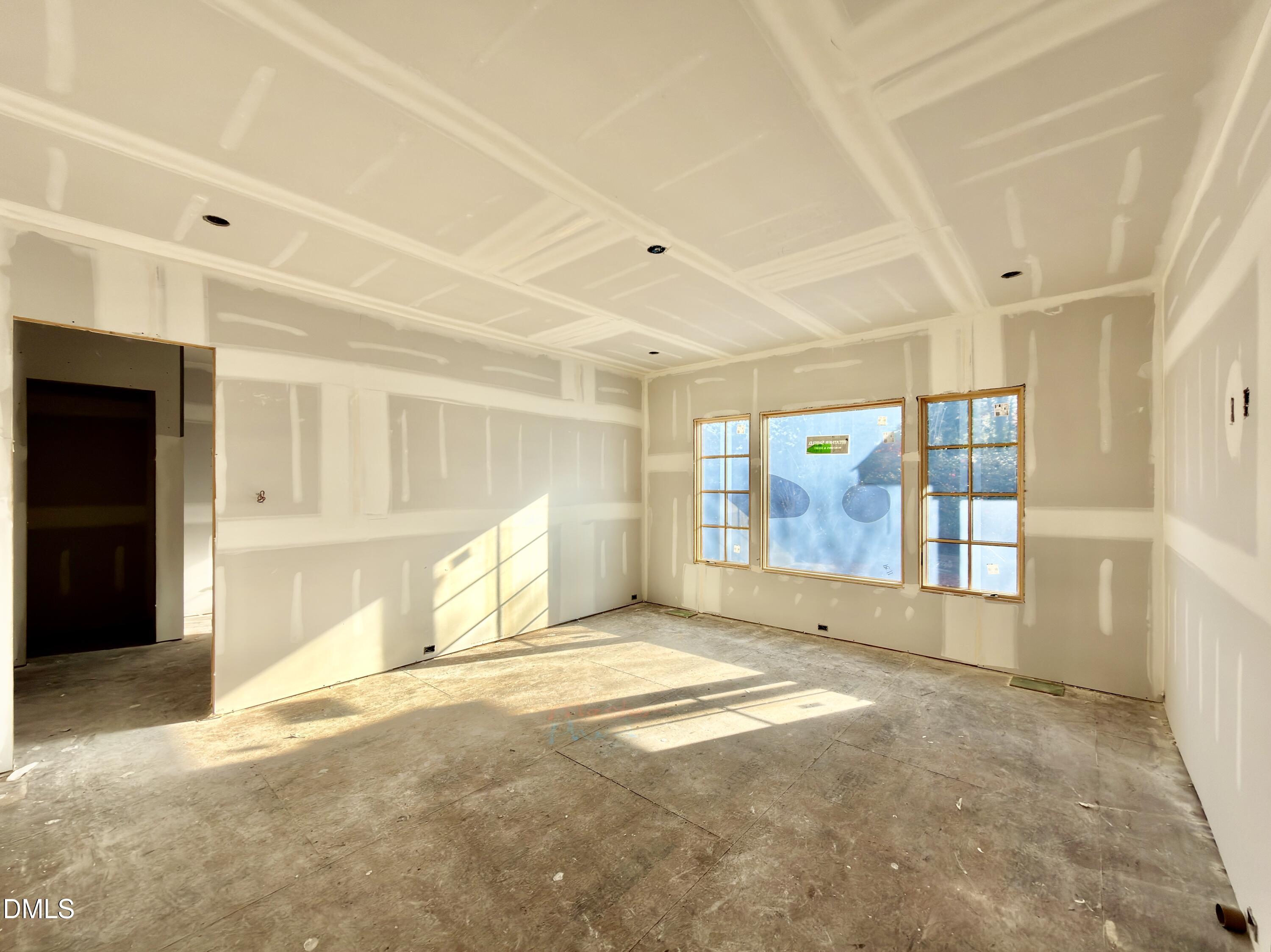 6832 Greystone Drive Raleigh, NC 27615 - Photo 26 of 51 a view of an empty room with a window