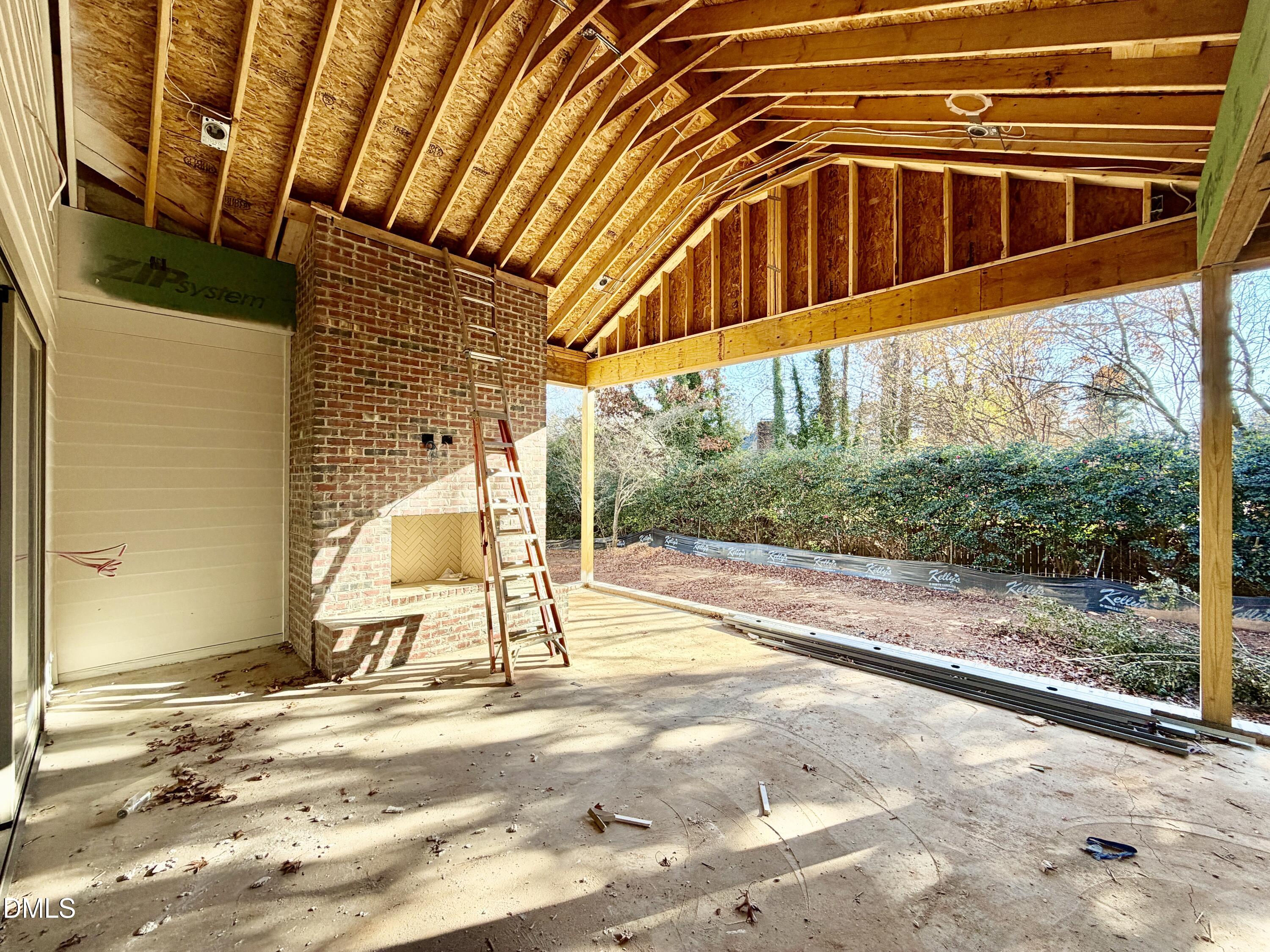 6832 Greystone Drive Raleigh, NC 27615 - Photo 32 of 51 a view of a backyard with a slide