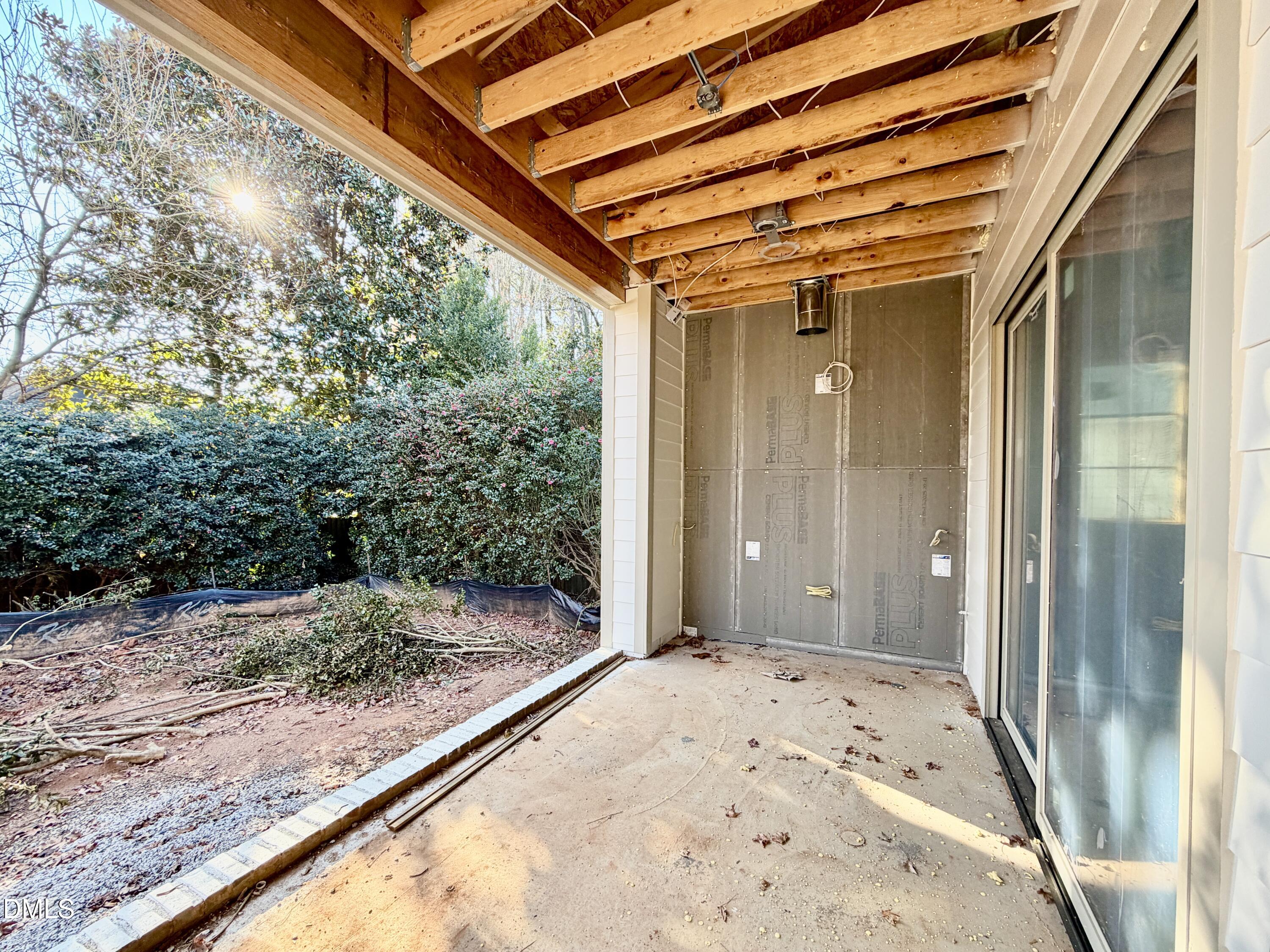 6832 Greystone Drive Raleigh, NC 27615 - Photo 35 of 51 a view of backyard with large tree