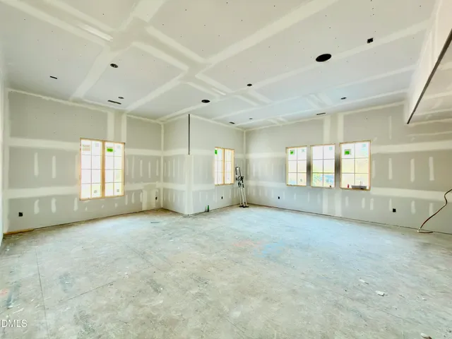 a view of a room with a large window